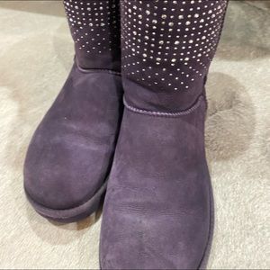 Purple UGG boots with crystals in front.  Shorter boots.  Size 8.  Slightly used